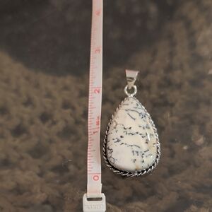Elegant Silver and White Teardrop Pendant